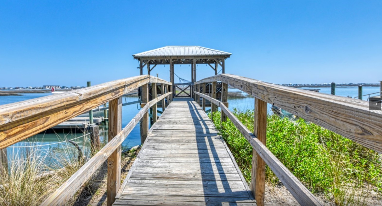 Private wooden dock walkway overlooking the Murrells Inlet salt marsh