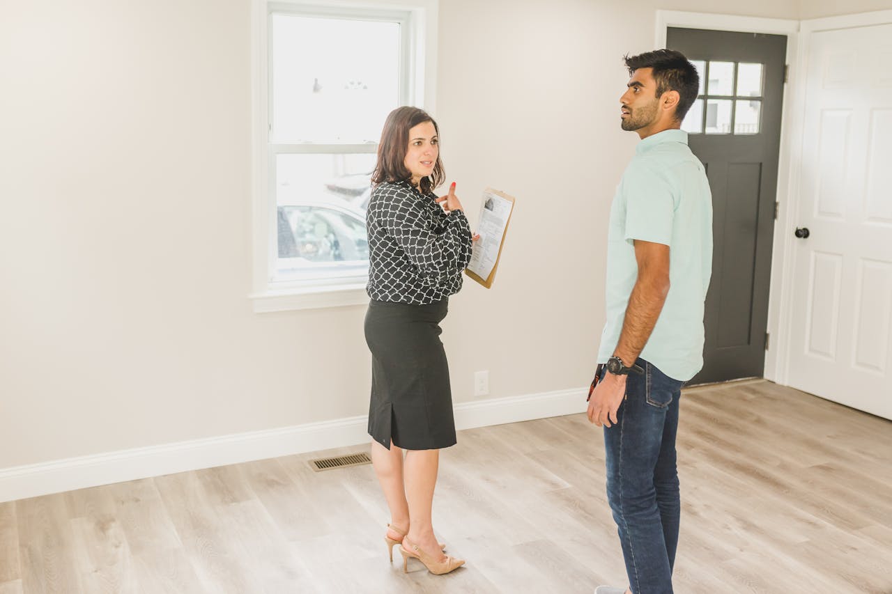 A man and a woman inside a house