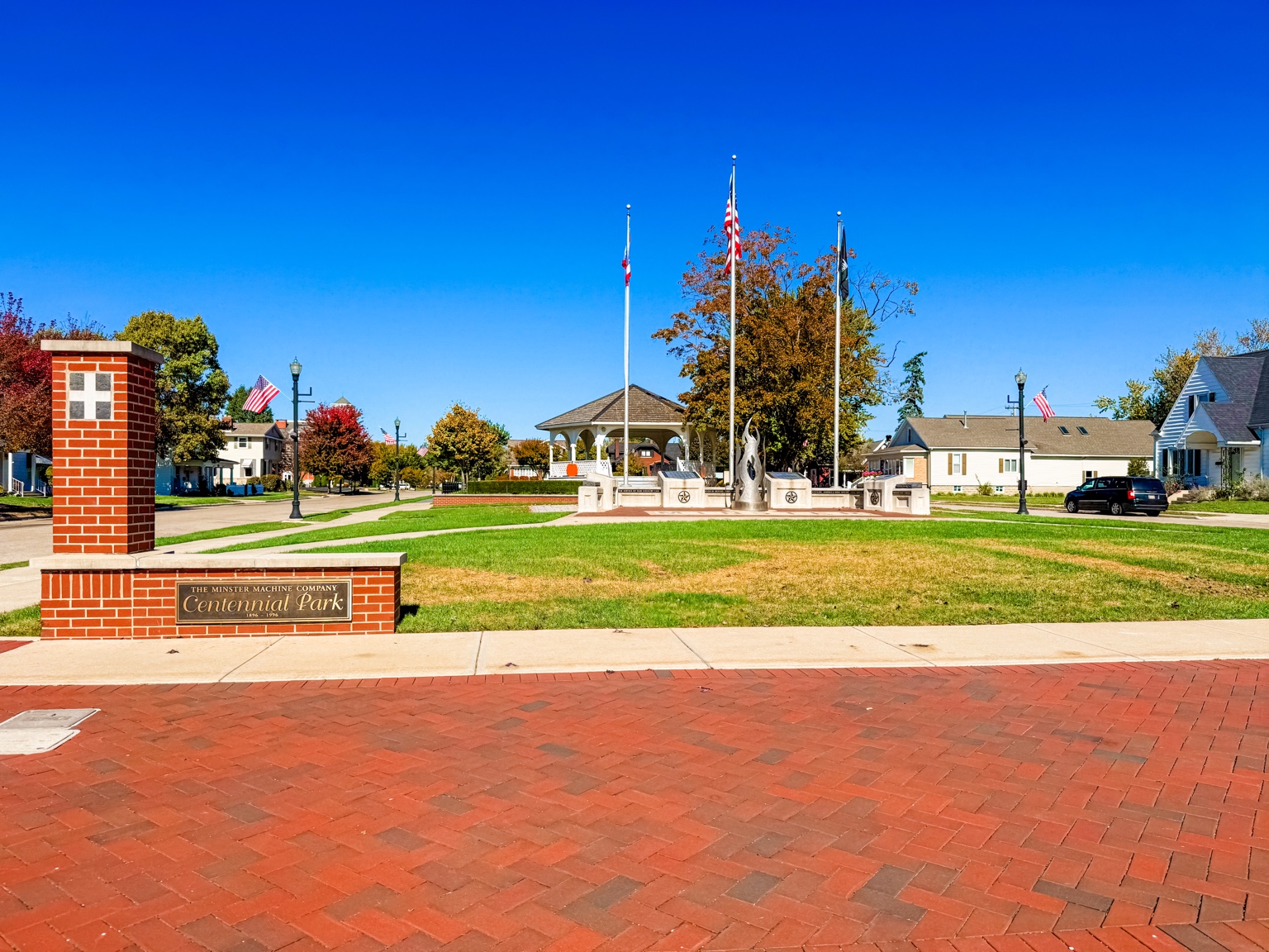 Minster Machine Centennial Park gazebo and veterans memorial flags
