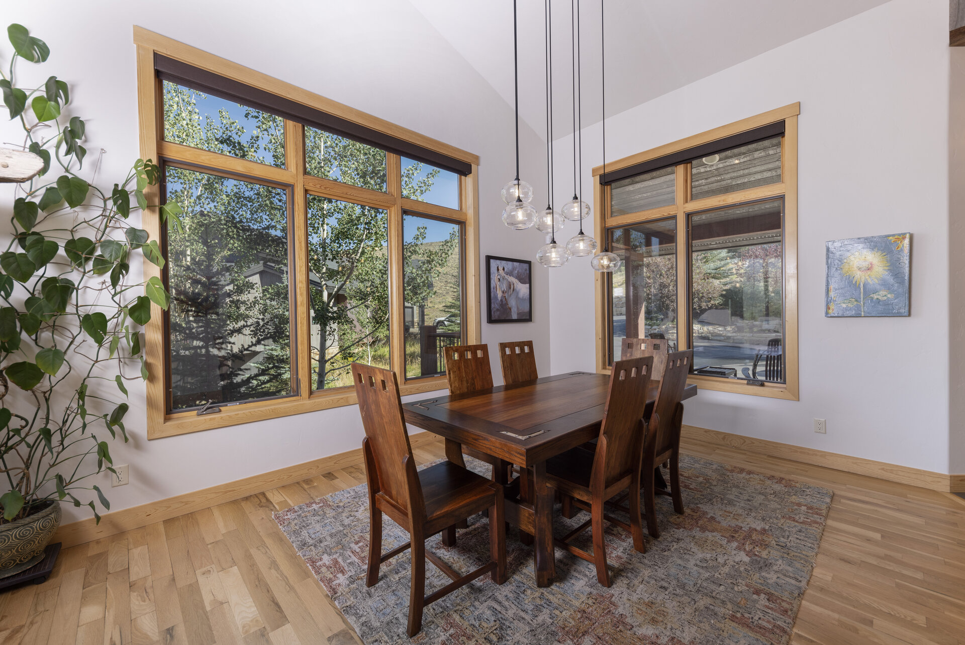 Dining area beside the windows with the mountain view