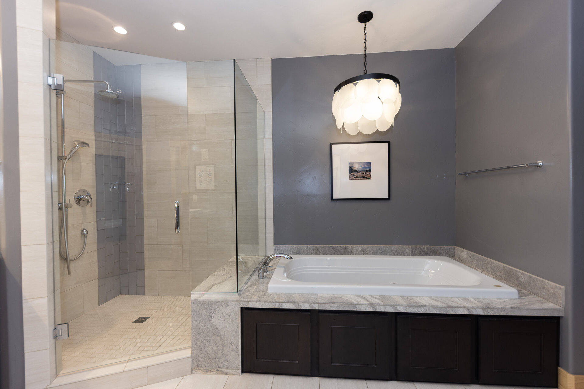 Primary bath with soaking tub and glass shower