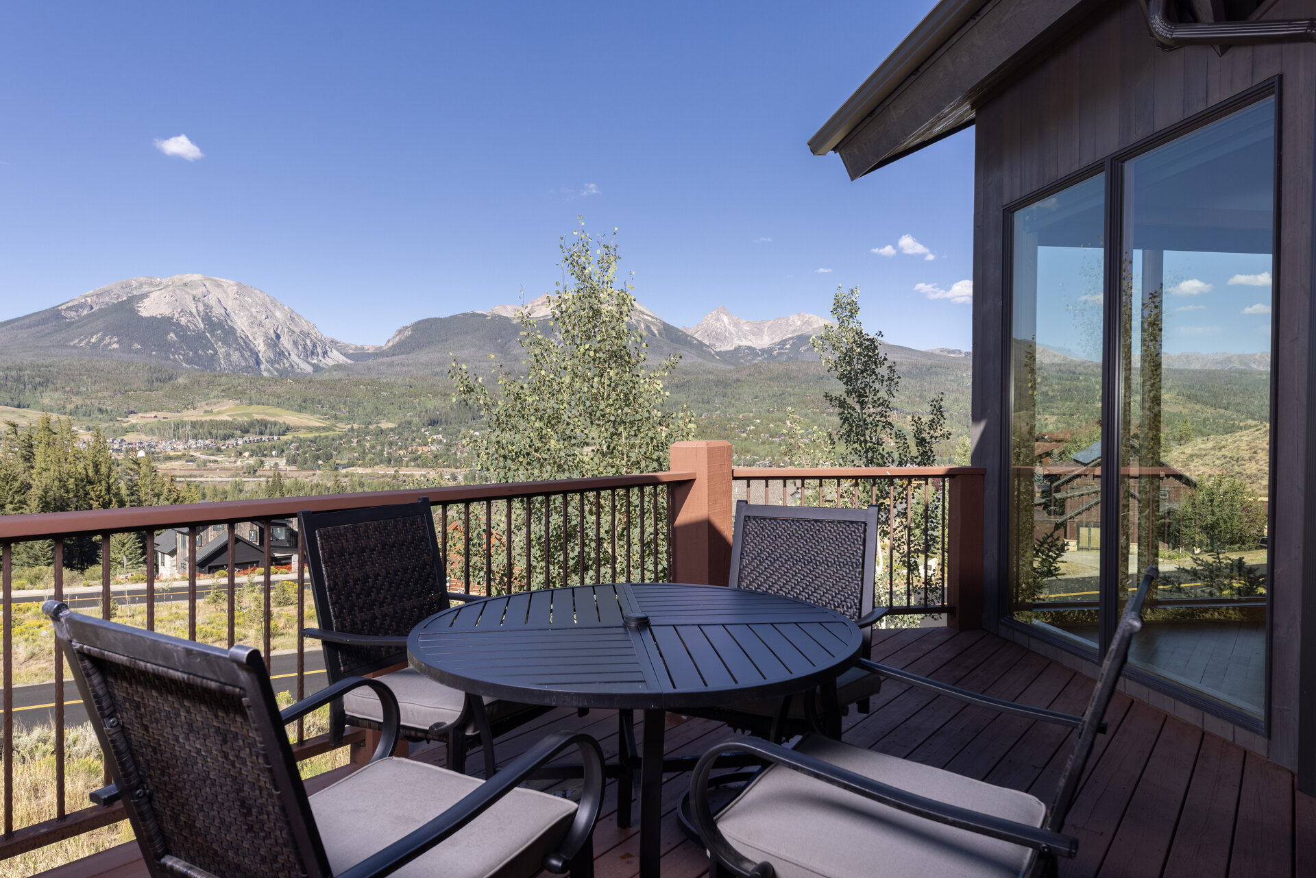 Deck dining area with the mountain backdrop