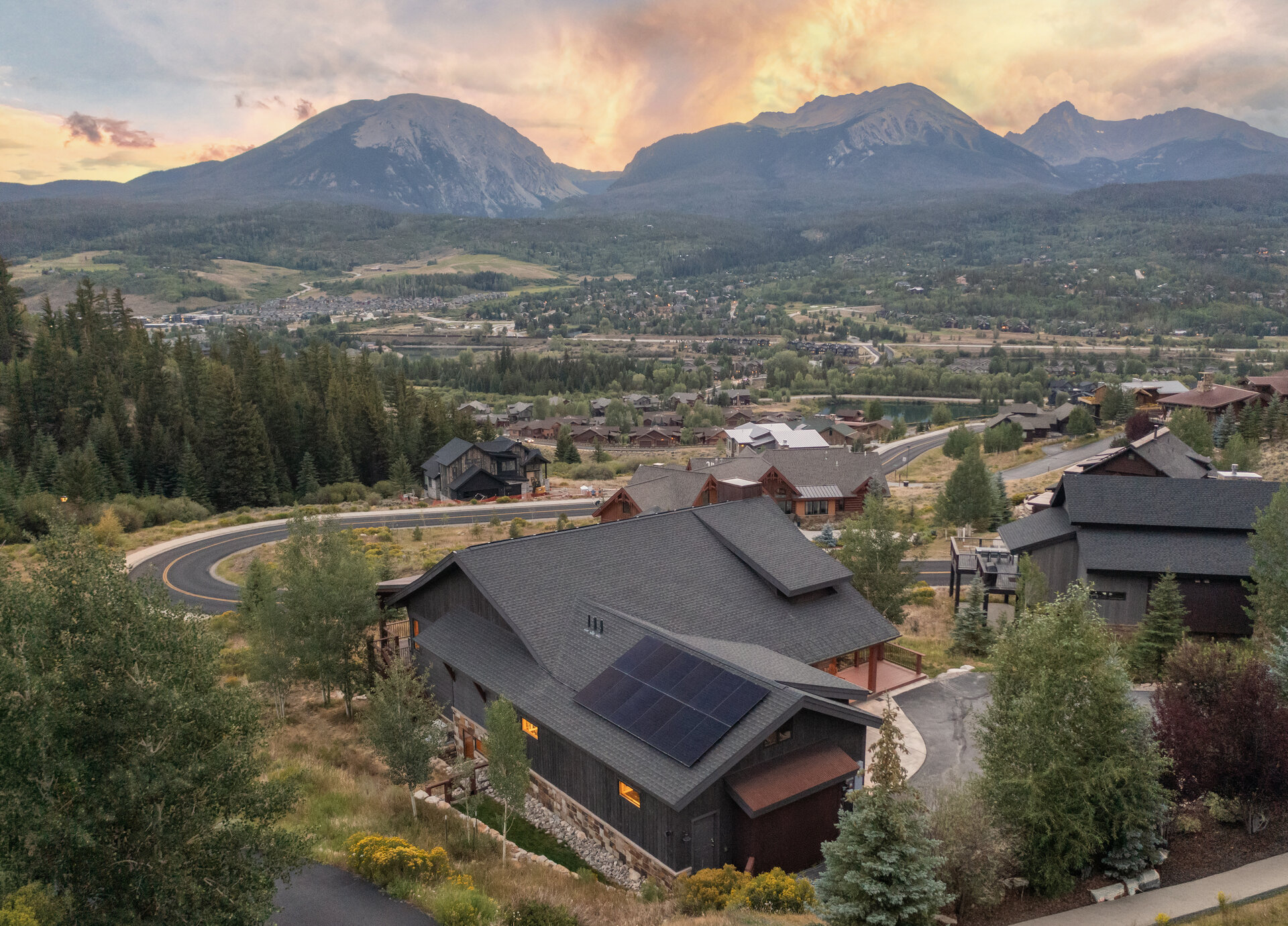 Twilight aerial over the neighborhood and peaks
