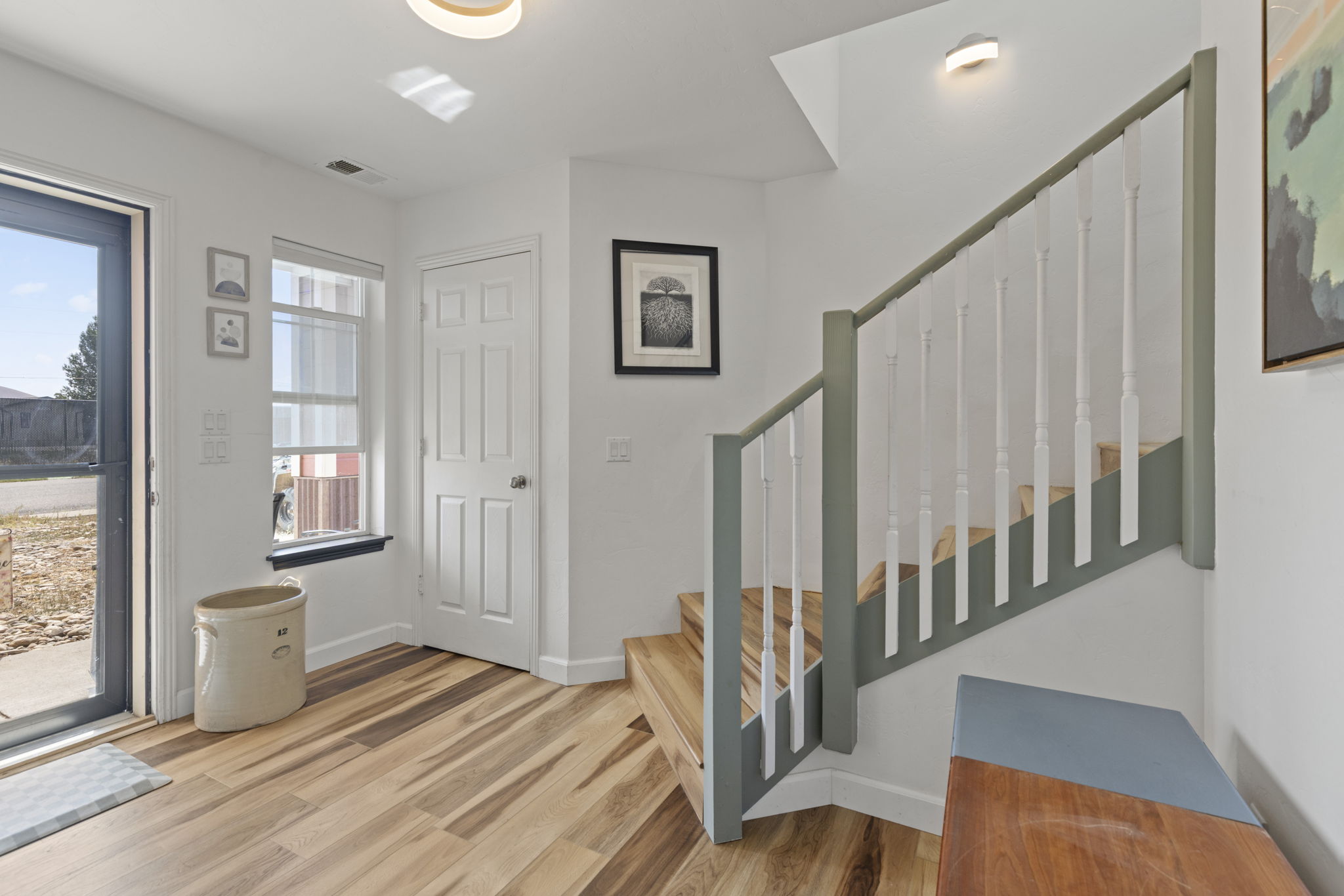 Entry and staircase to the upper level bedrooms in the Kremmling home
