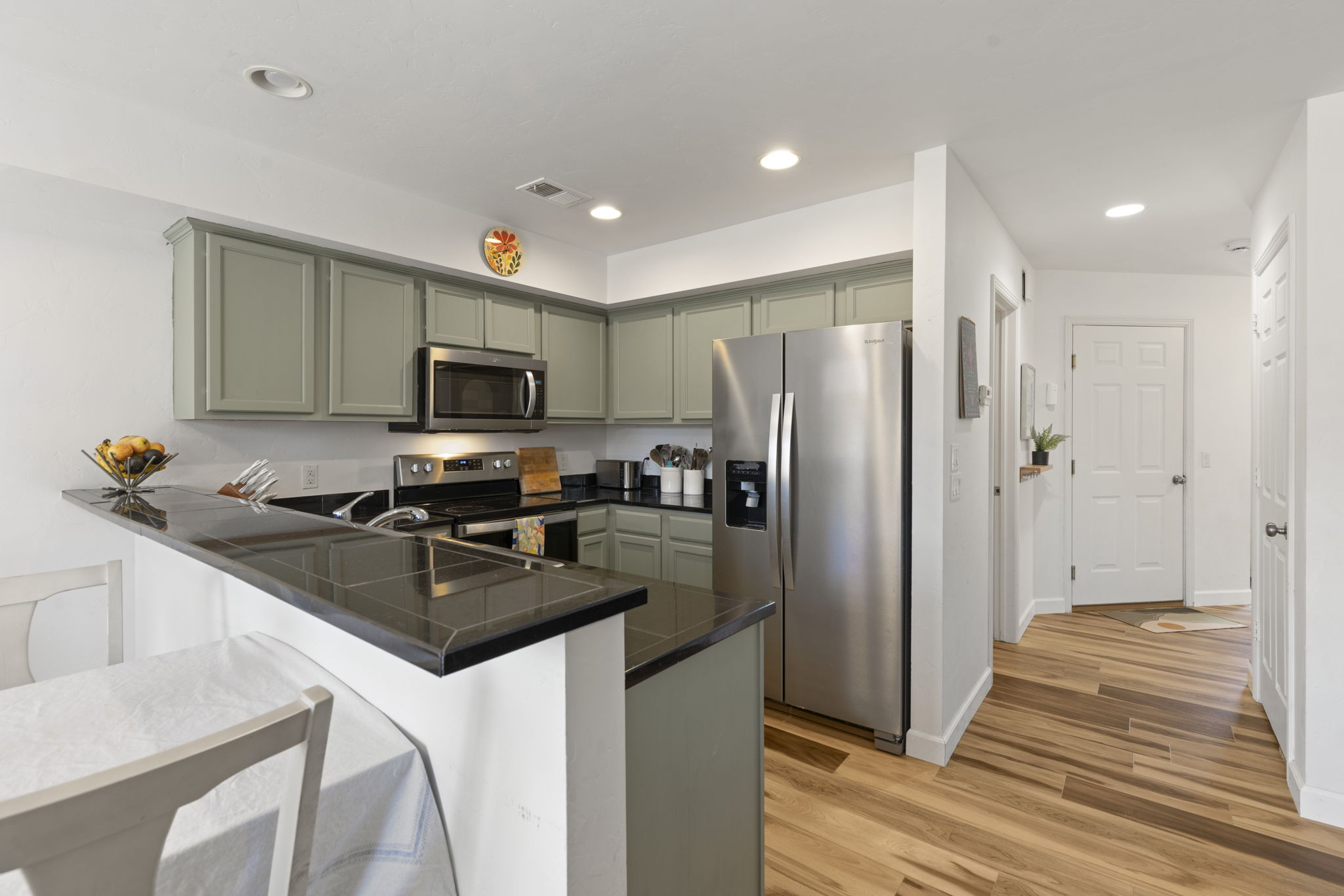Kitchen second angle showing refrigerator and pantry in Kremmling