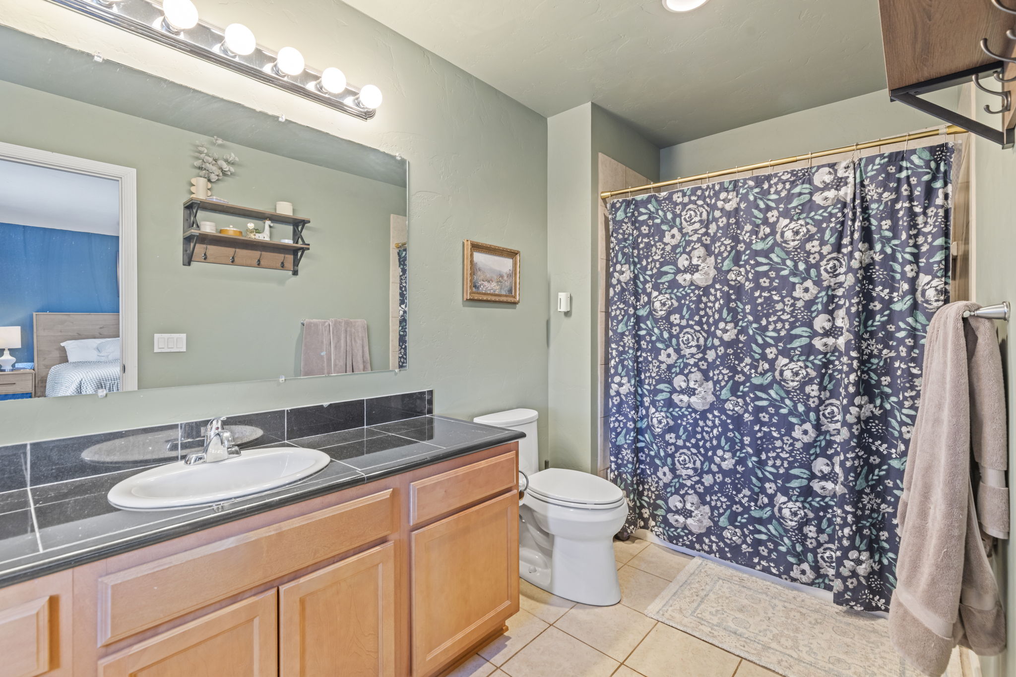 Primary en suite bathroom with vanity and shower in Kremmling