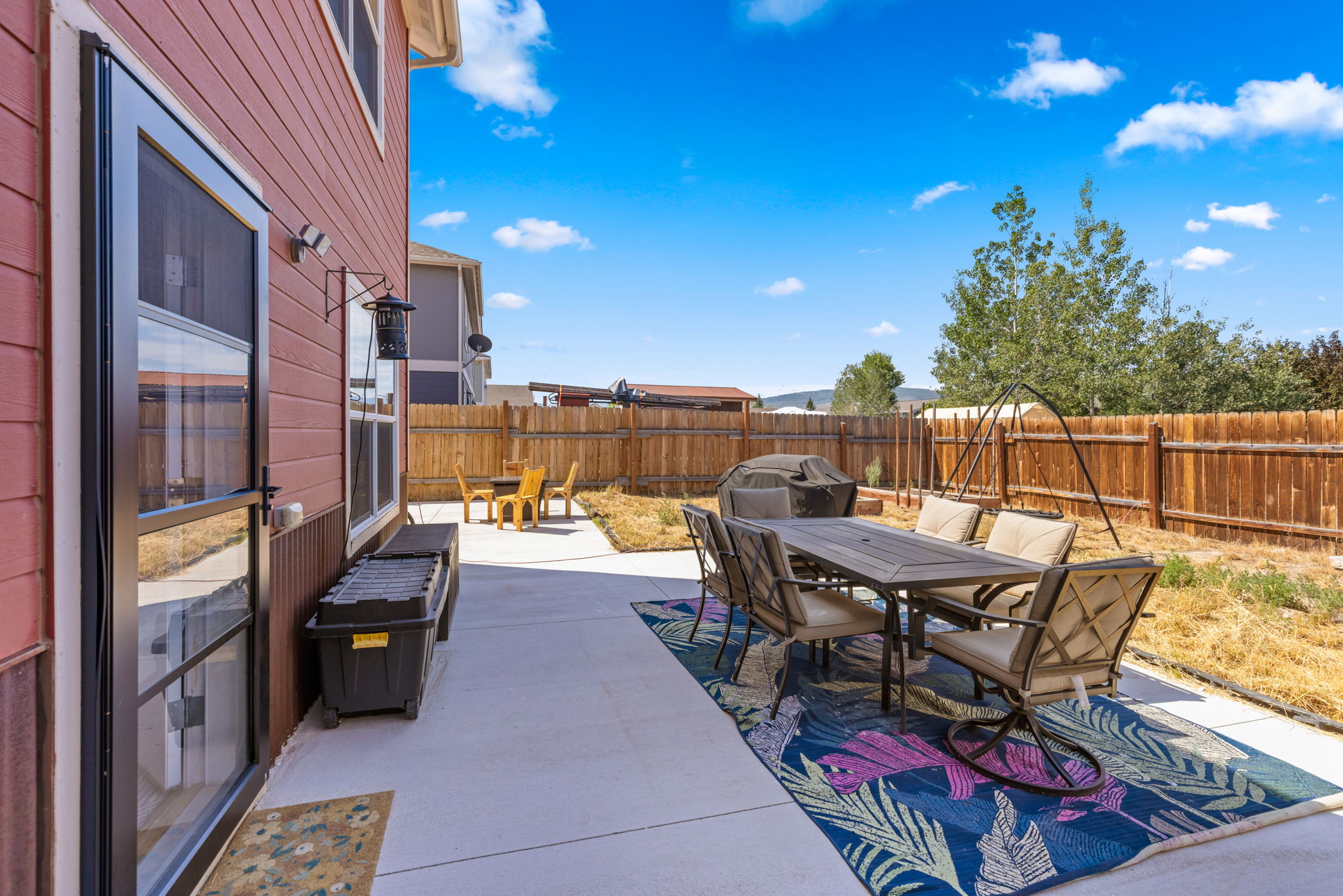 Back patio and fully fenced yard at 509 N 12th Street A, Kremmling