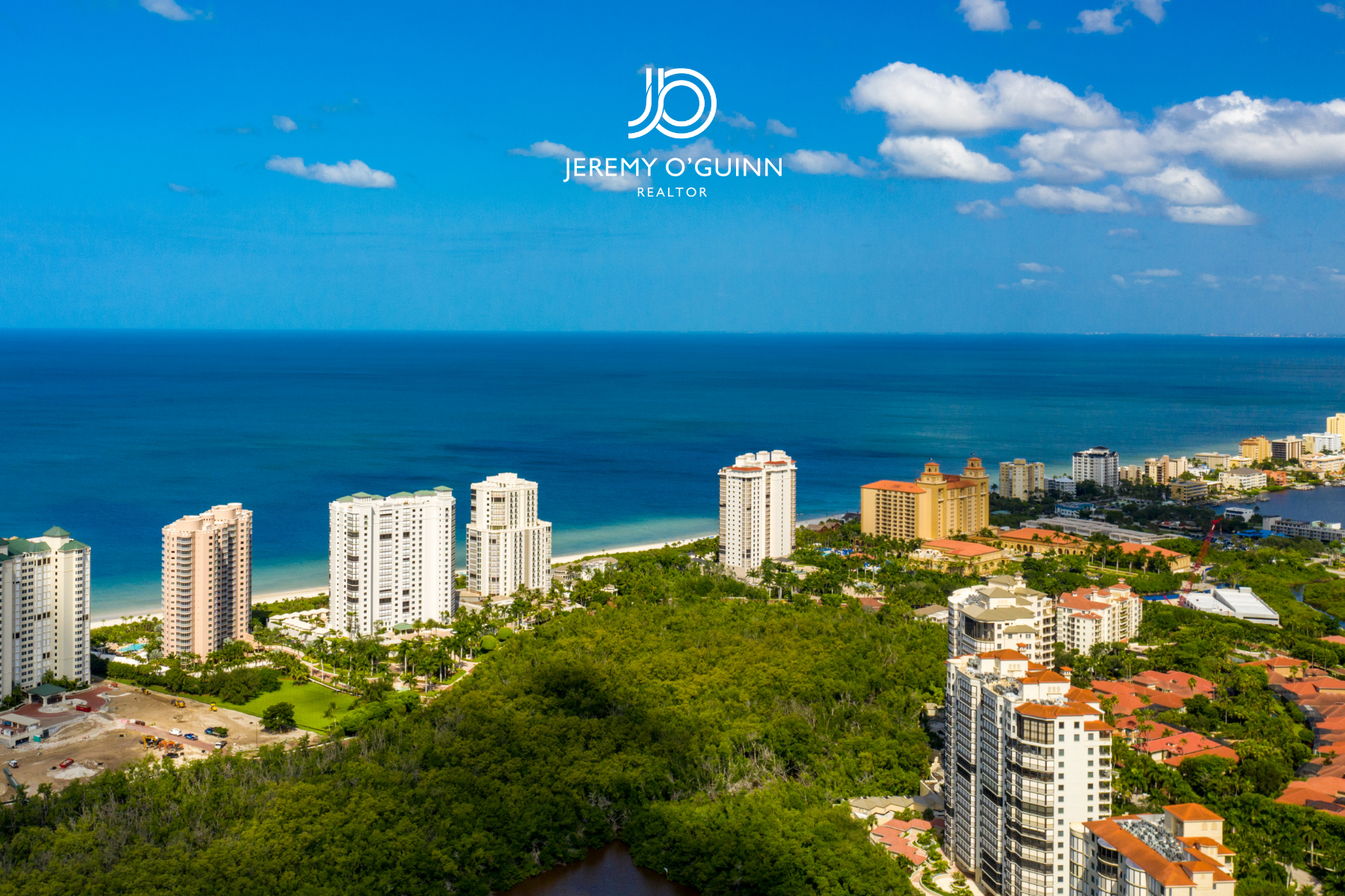 Aerial view of Bay Colony and Park Shore luxury beachfront condominiums in Naples Florida along the Gulf of Mexico