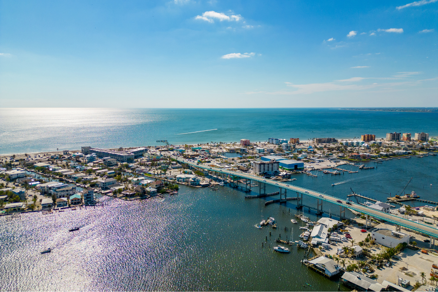 Aerial view of Fort Myers Beach Florida on Estero Island showing Gulf of Mexico shoreline and waterfront real estate