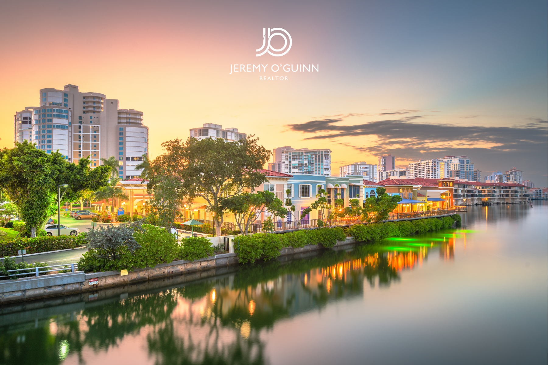Naples Florida waterway at sunset with waterfront homes and condominiums reflecting in calm water