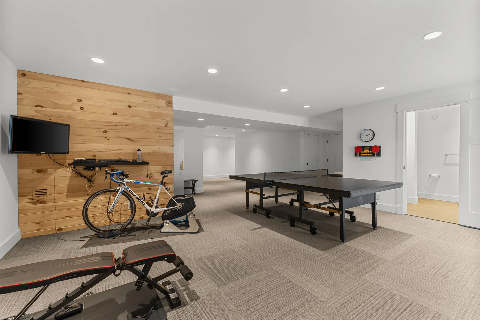 Finished lower level recreation and fitness space