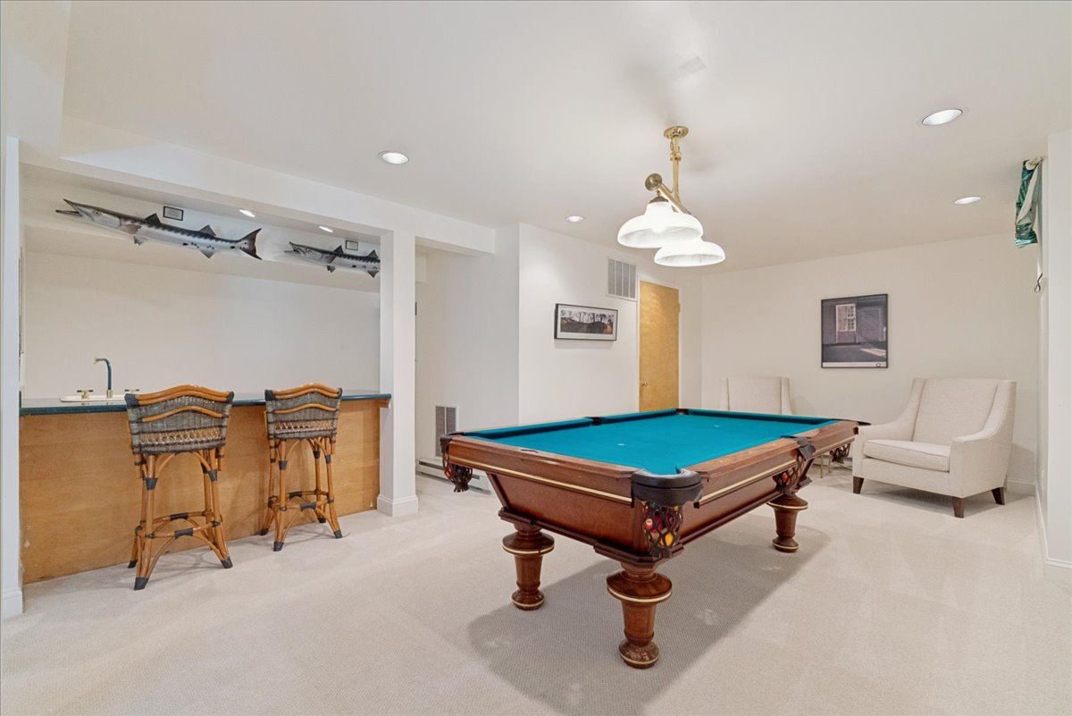 Finished walkout lower level recreation room and wet bar at 15 Copper Vail Court, Princeton NJ