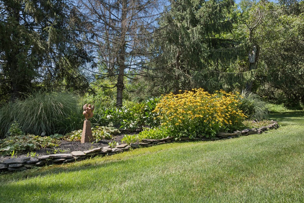 Landscaped gardens and lawn at 15 Copper Vail Court in Princeton NJ