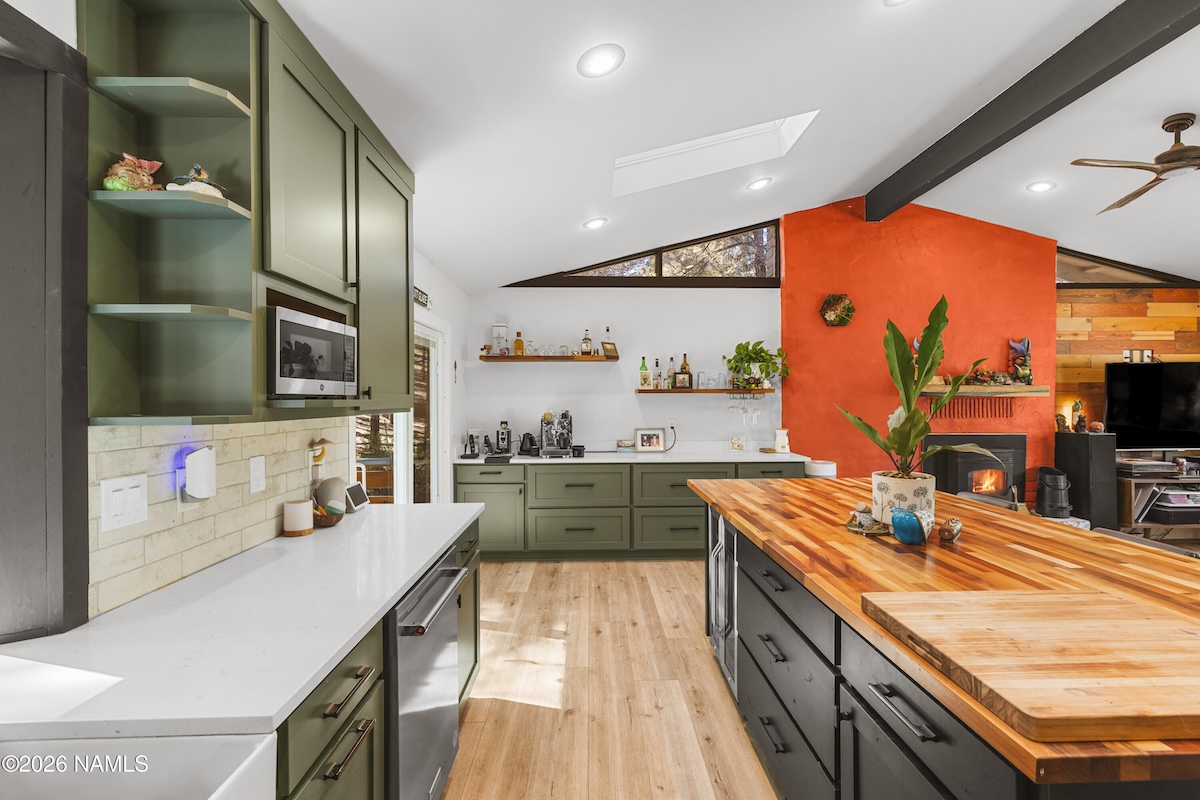 Oversized butcher-block island and updated cabinetry at 2857 W Darleen Dr, Flagstaff, AZ