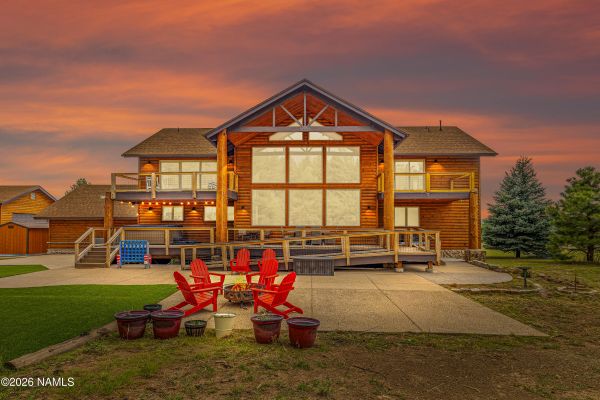 Trex deck with San Francisco Peaks and ponderosa pine forest views at 8900 N Snowbowl Ranch Rd in Flagstaff AZ