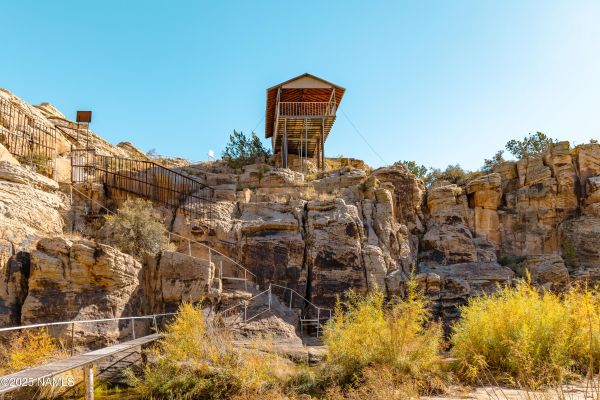 Outdoor recreation setting with hiking, rock climbing, and exploration opportunities at Rock Art Ranch