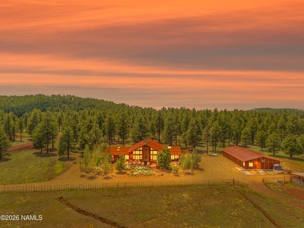 Craftsman western home and grazing pasture at 14317 E Keith Dr, a Northern Arizona horse property for sale in Parks, AZ