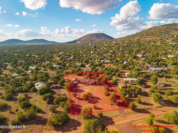 Extra-wide two-car garage with workshop at 1783 E Whitehall Dr, Williams, AZ