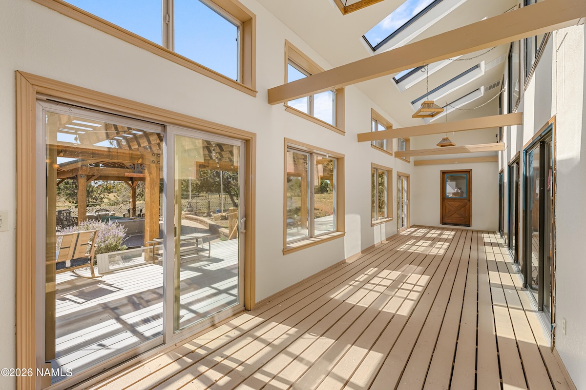 Passive-solar greenhouse sunroom with skylights at 13074 Longhorn Way, Flagstaff, AZ