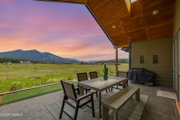 Back patio with unobstructed San Francisco Peaks mountain views at a Fort Valley luxury home in Flagstaff, AZ