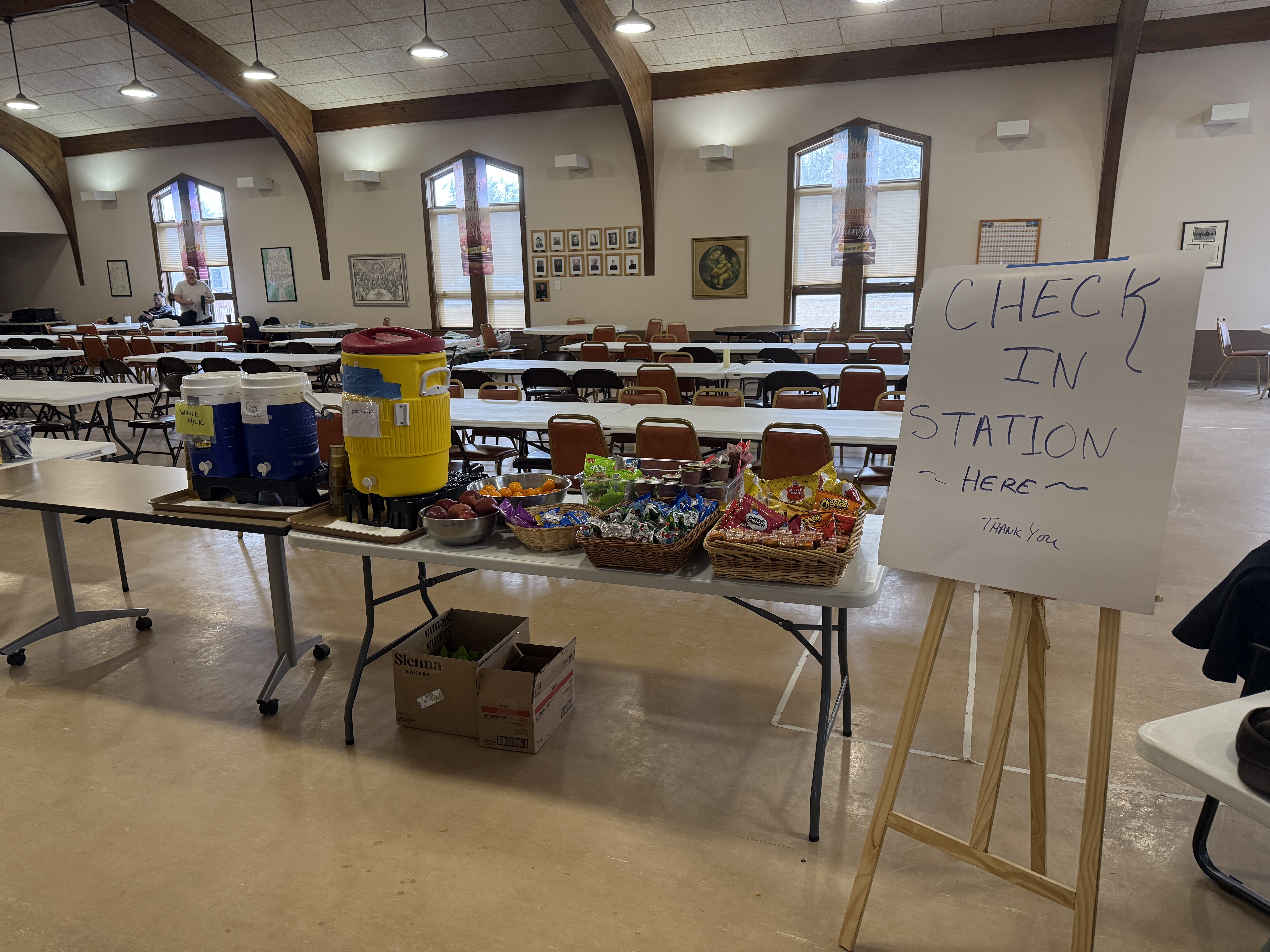 Volunteers and community members at the St. Francis emergency shelter during the 2025 ice storm in Lewiston, Michigan - Huston Real Estate