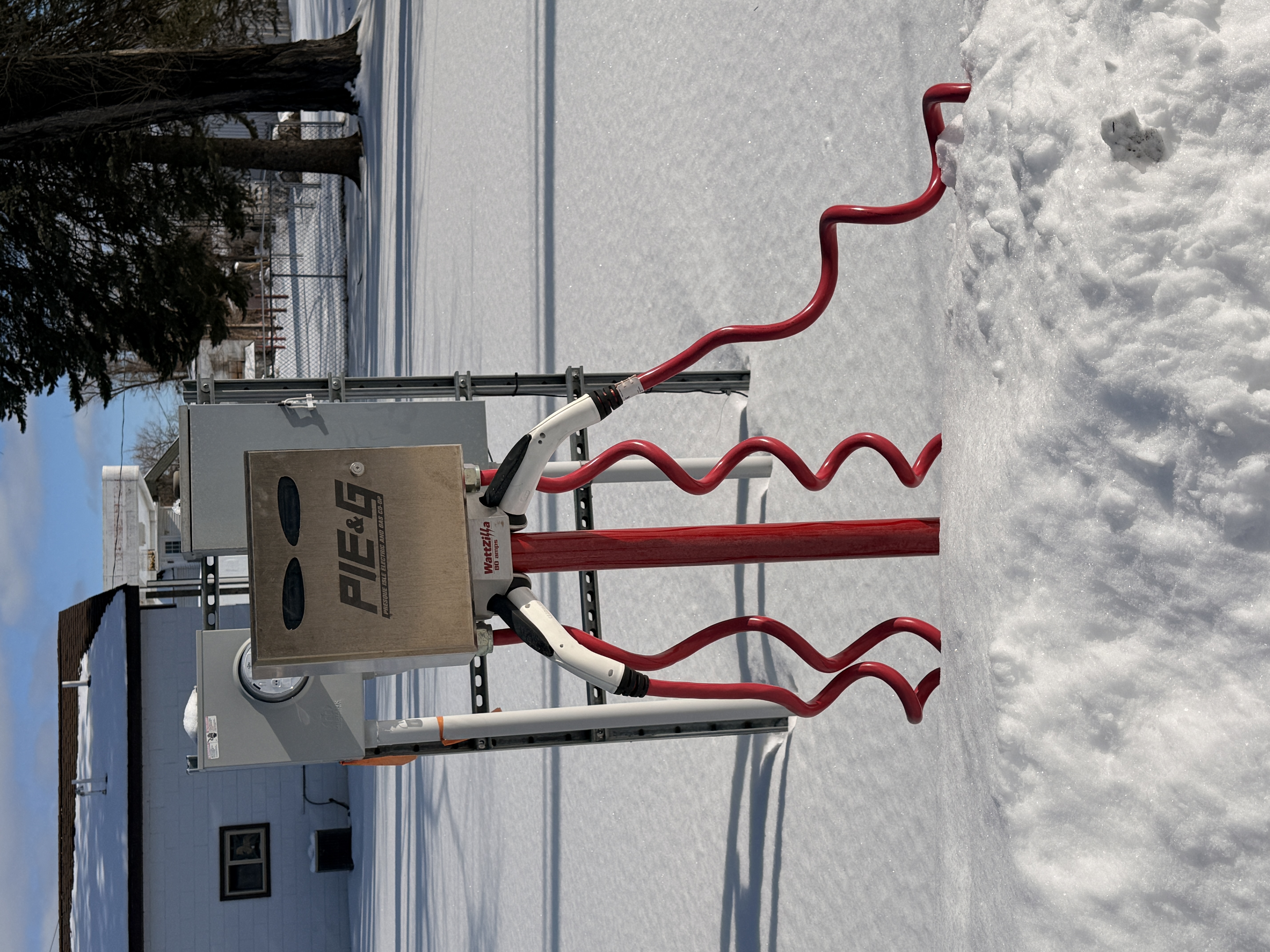 EV charging station near Briley Township Park in Atlanta, Michigan - Huston Real Estate
