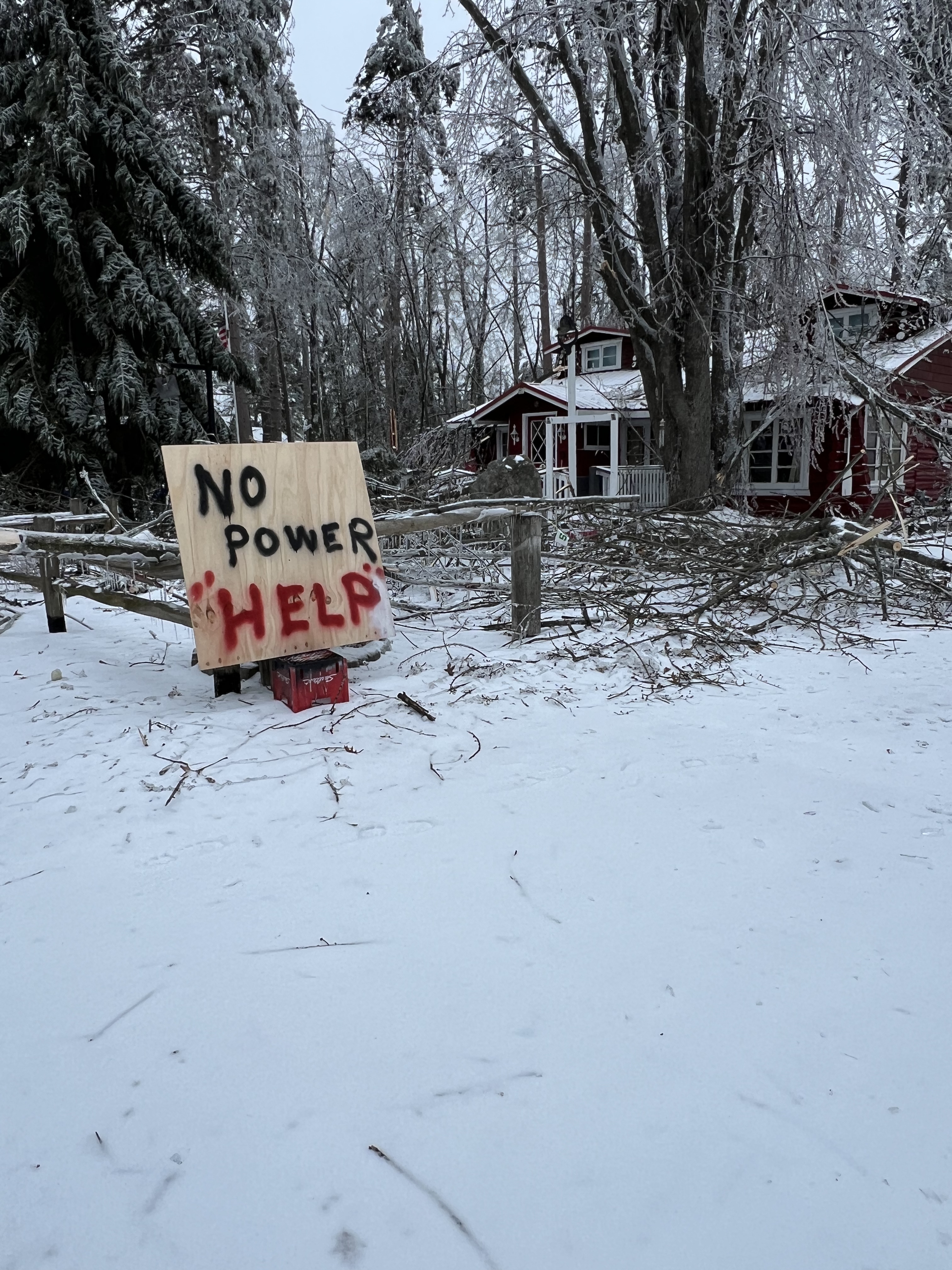 Lewiston Michigan community members helping neighbors during ice storm recovery - Huston Real Estate