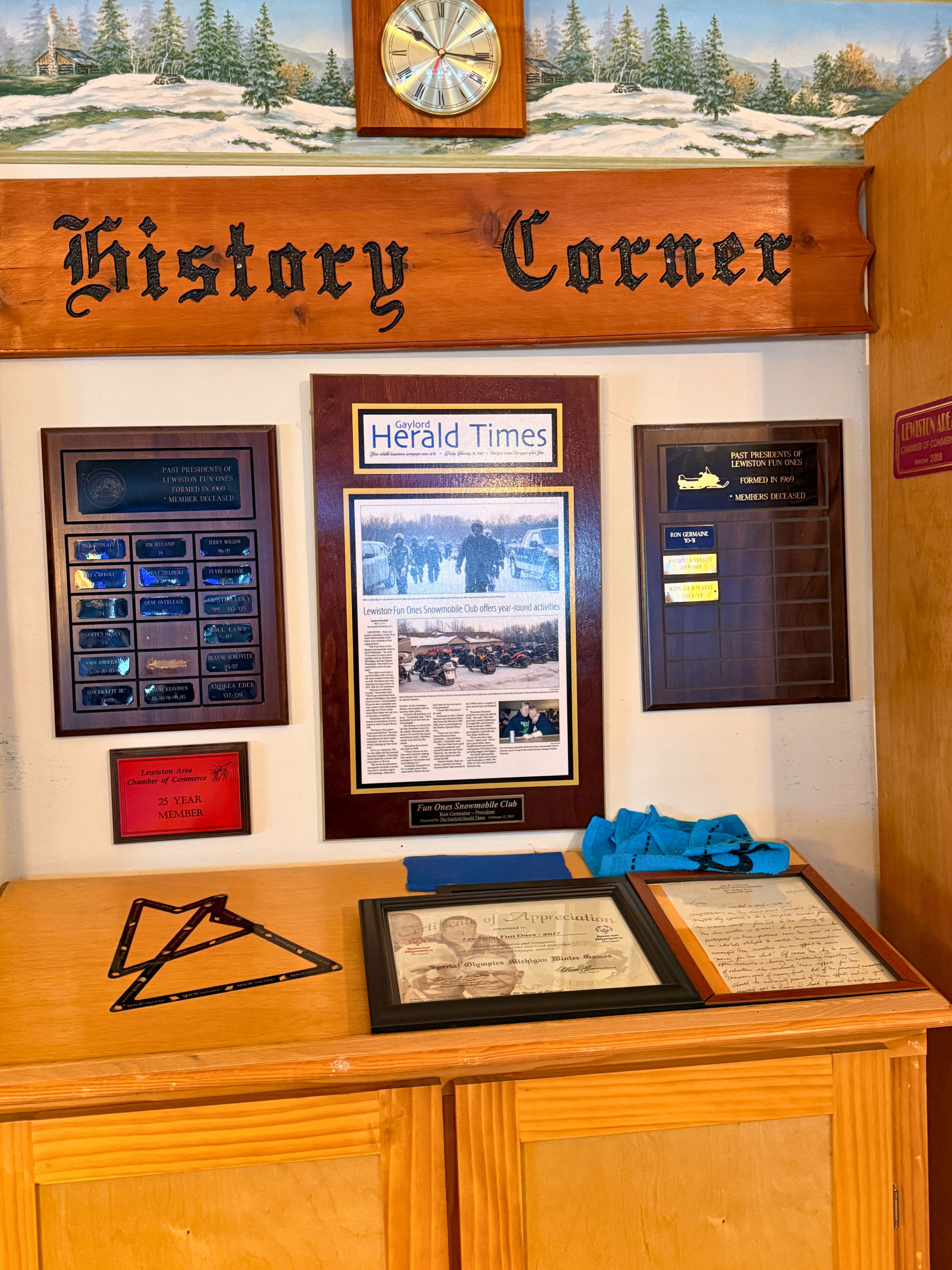 History corner at Lewiston Fun Ones displaying club heritage - Huston Real Estate