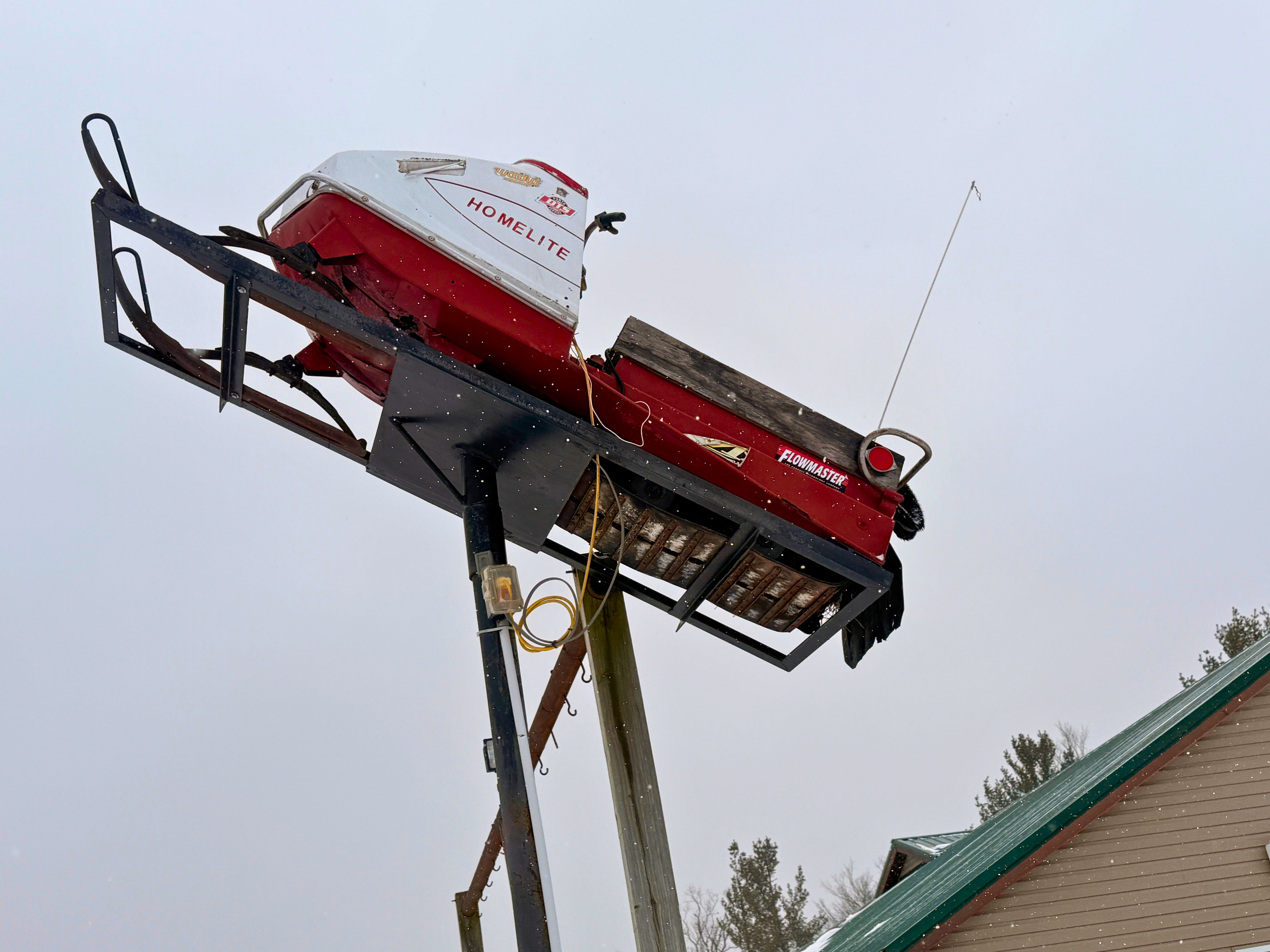 Vintage snowmobile on display at Lewiston Fun Ones - Huston Real Estate