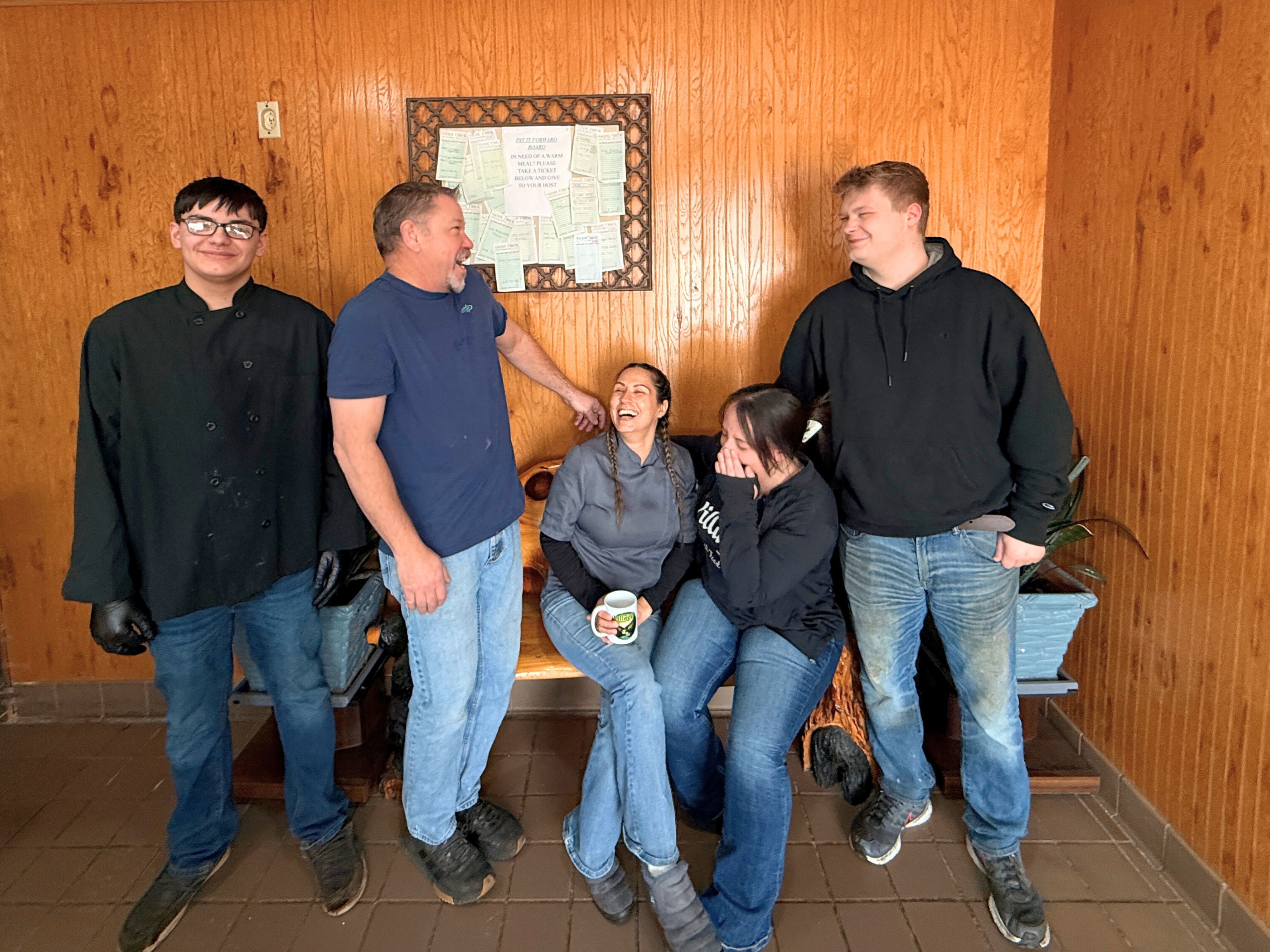 The Villager Restaurant staff having fun - Northern Michigan community spirit - Huston Real Estate