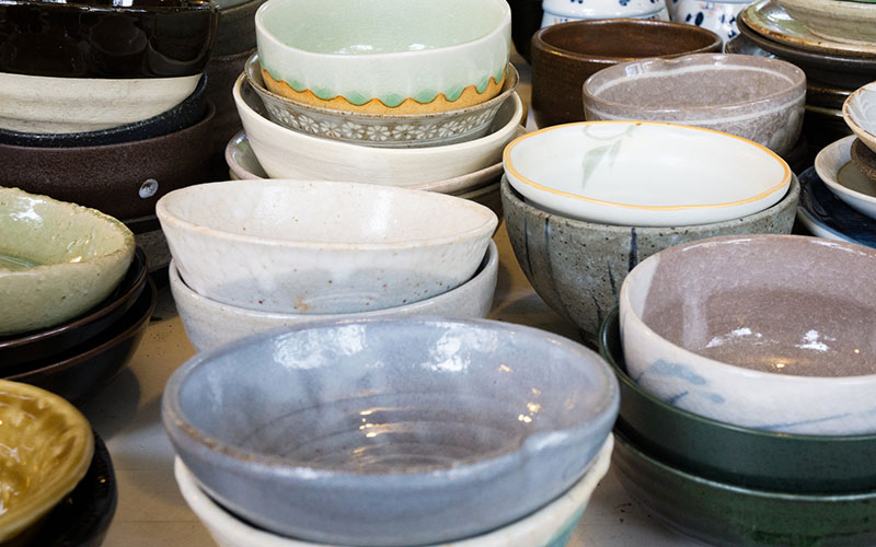 Handmade ceramic bowls stacked on a table
