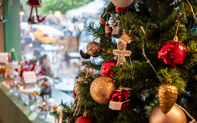 Outdoor holiday market stalls with handmade goods