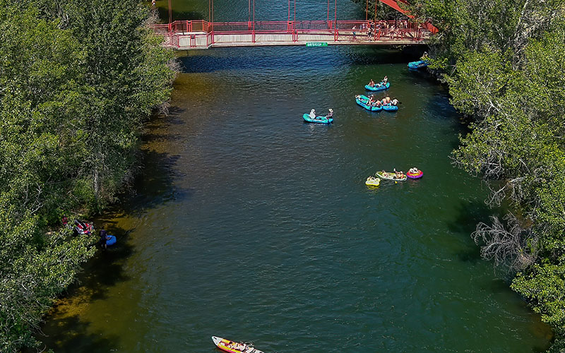 River put-in with rafts and tubes