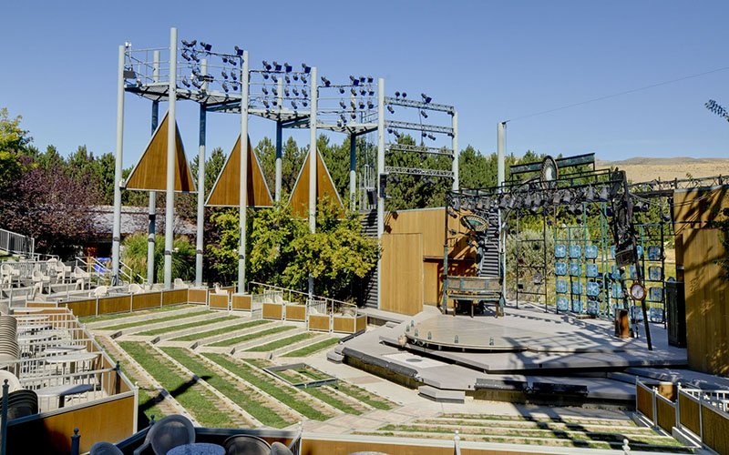 Outdoor amphitheater stage at dusk