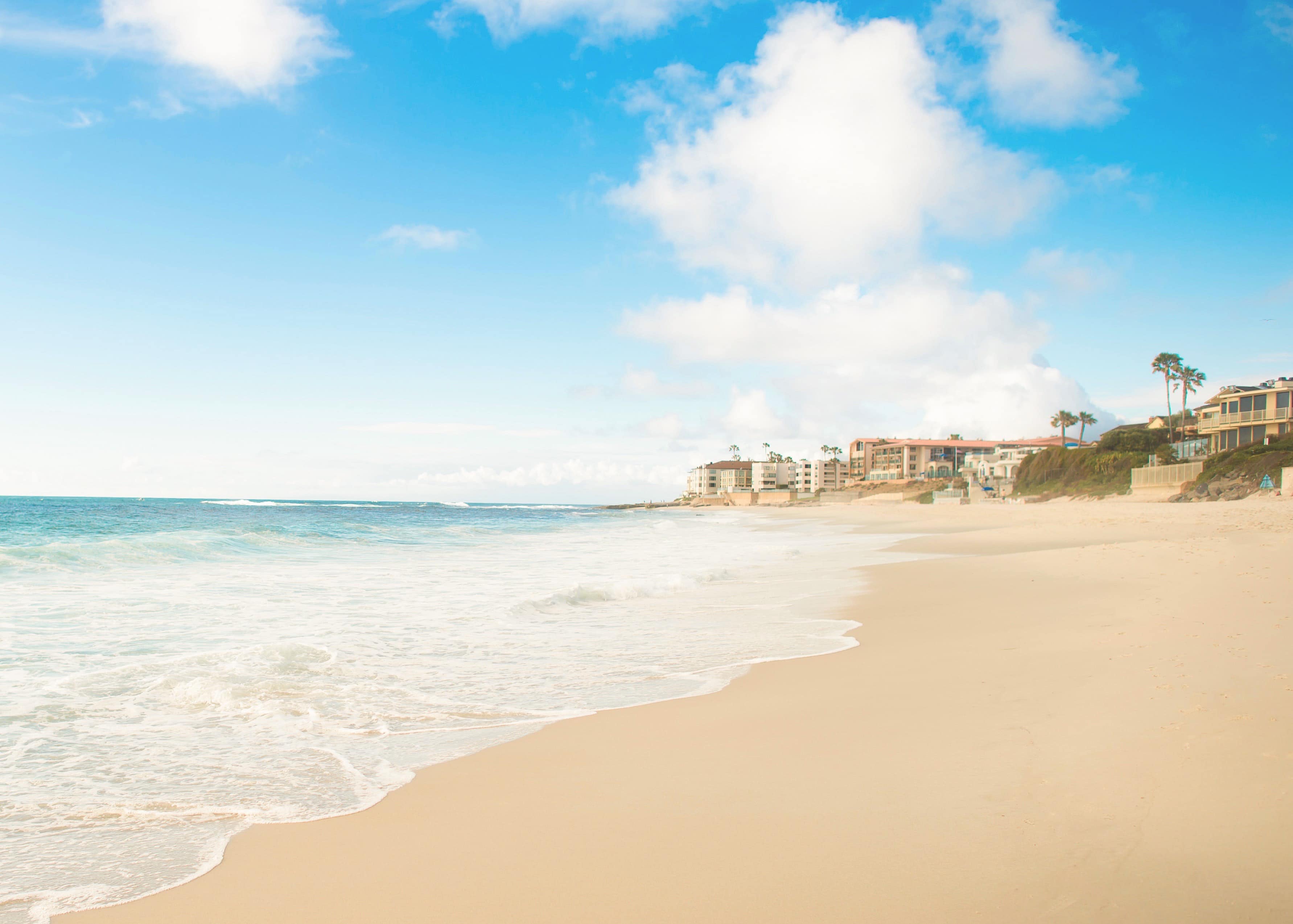 private beach in Pedregal, Cabo San Lucas, with crystal-clear waters and pristine white sand