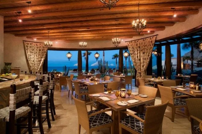 The elegant beach club of the Waldorf Astoria Los Cabos Pedregal resort, offering world-class amenities to guests.