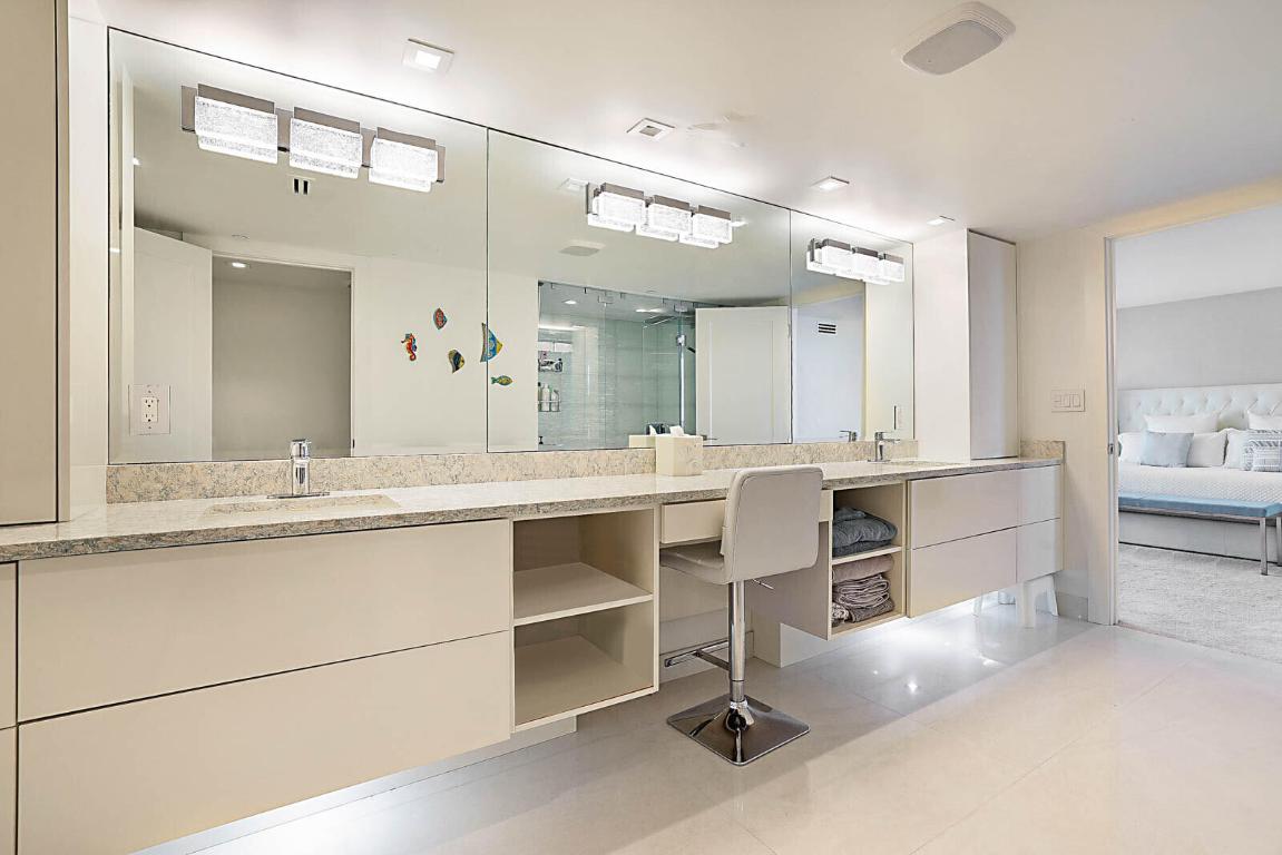 Renovated primary bathroom with double vanity