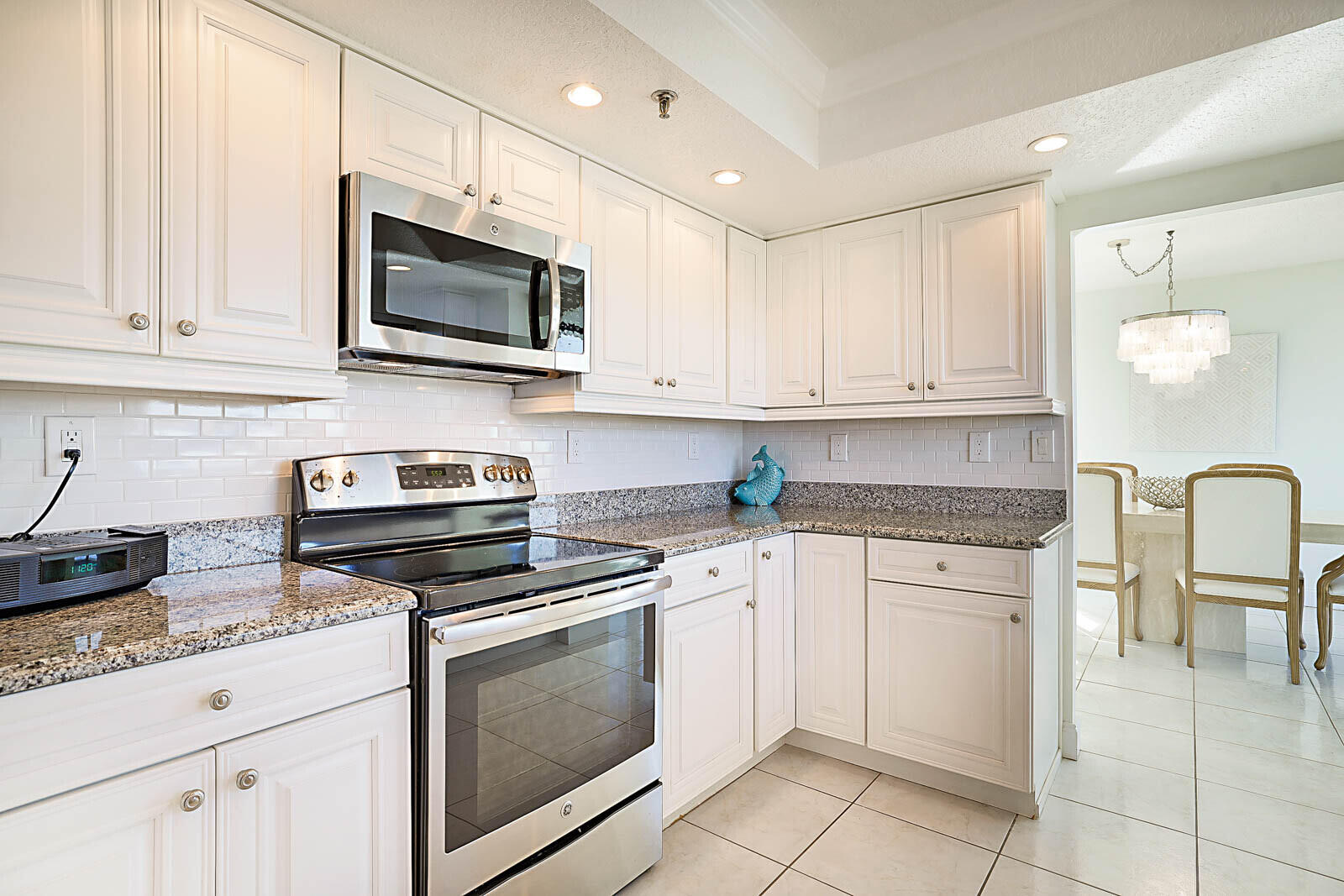 Eat-in kitchen with granite counters at 2917 S Ocean Blvd #405