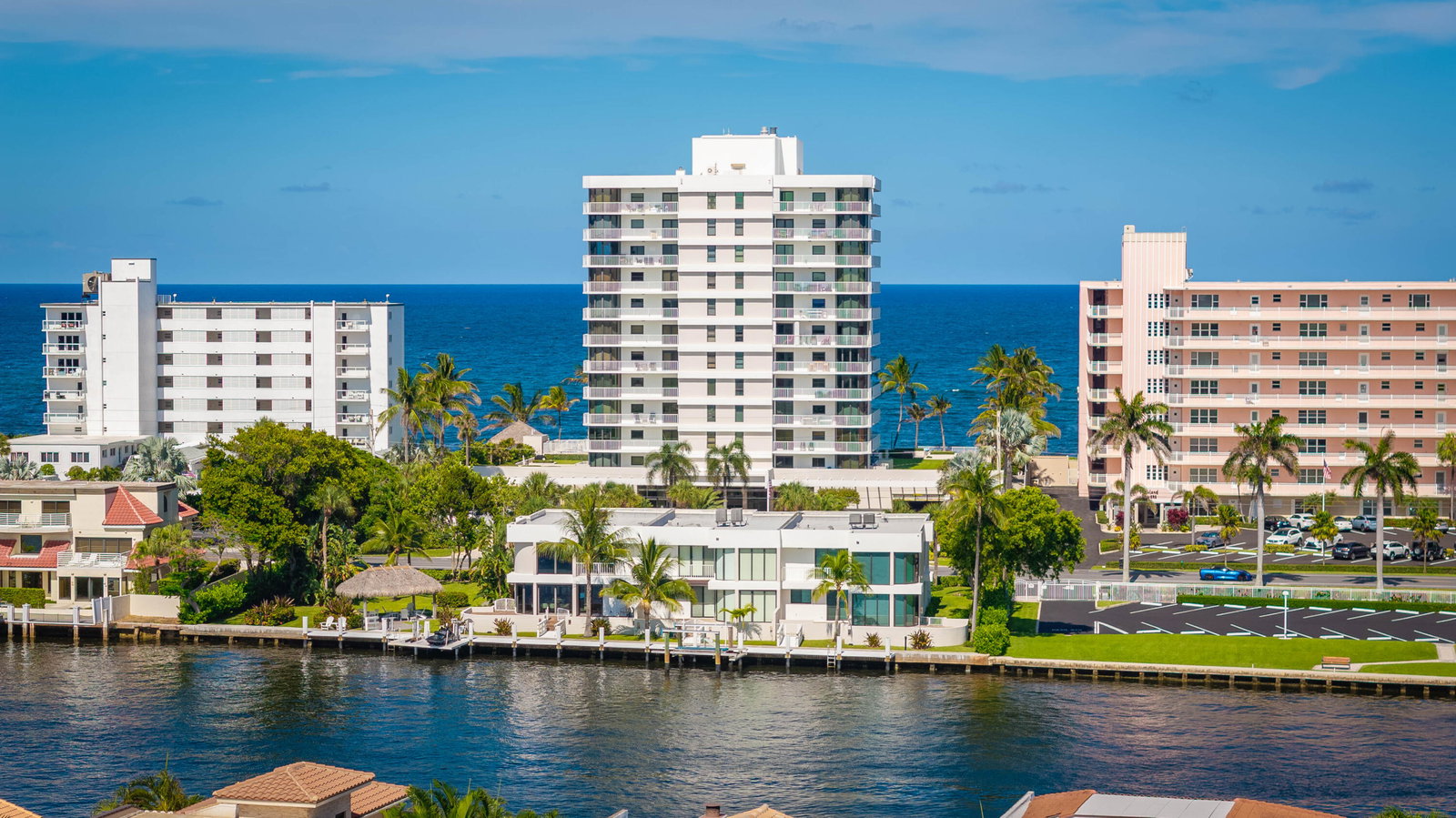 Aerial view of the oceanfront building and Highland Beach coastline