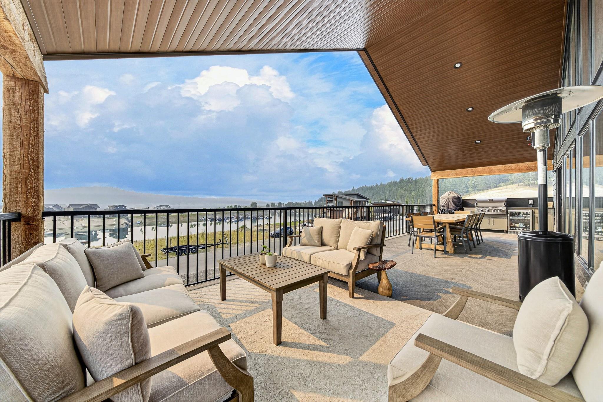 Covered deck lounge with lake views at 1731 Marina Estates Road