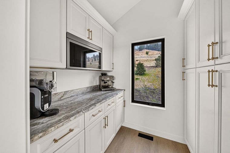 Butler-style pantry with additional counter space at 1731 Marina Estates Road