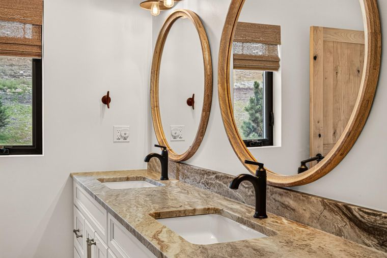 Double vanity in the primary ensuite at 1731 Marina Estates Road