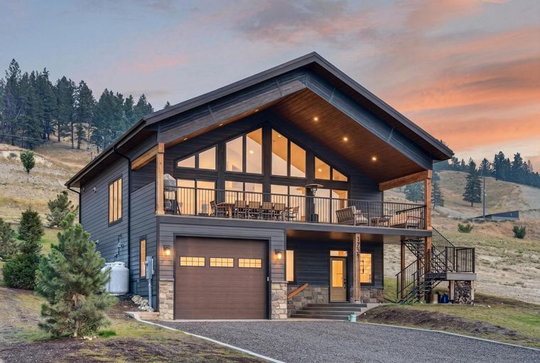 Front exterior in the listing&rsquo;s twilight photograph at 1731 Marina Estates Road
