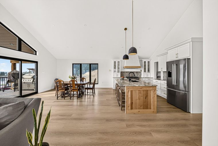 Connected living, dining and kitchen spaces at 1731 Marina Estates Road