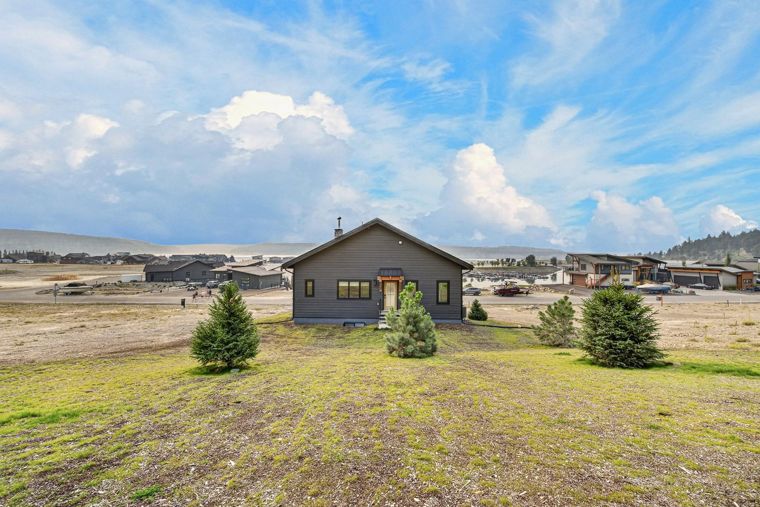 Rear exterior and hillside setting at 1731 Marina Estates Road