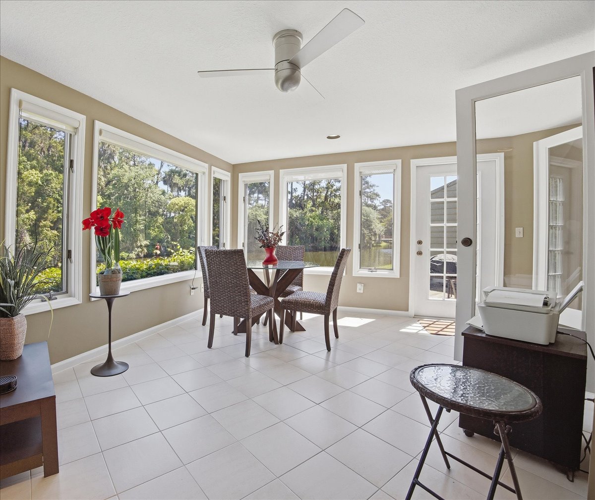 Sunroom overlooking the water at 94 Players Club Villas