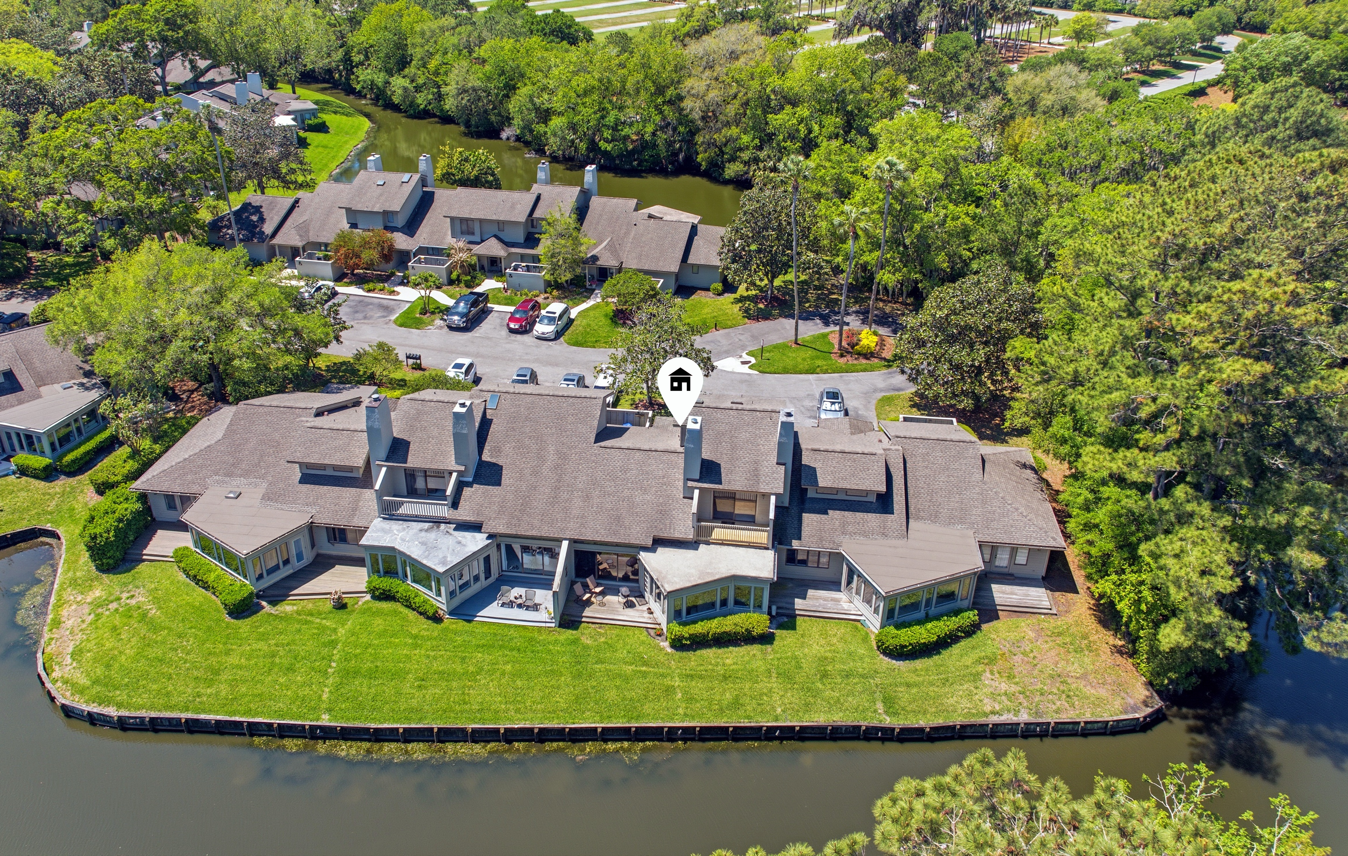 Aerial water view behind 94 Players Club Villas