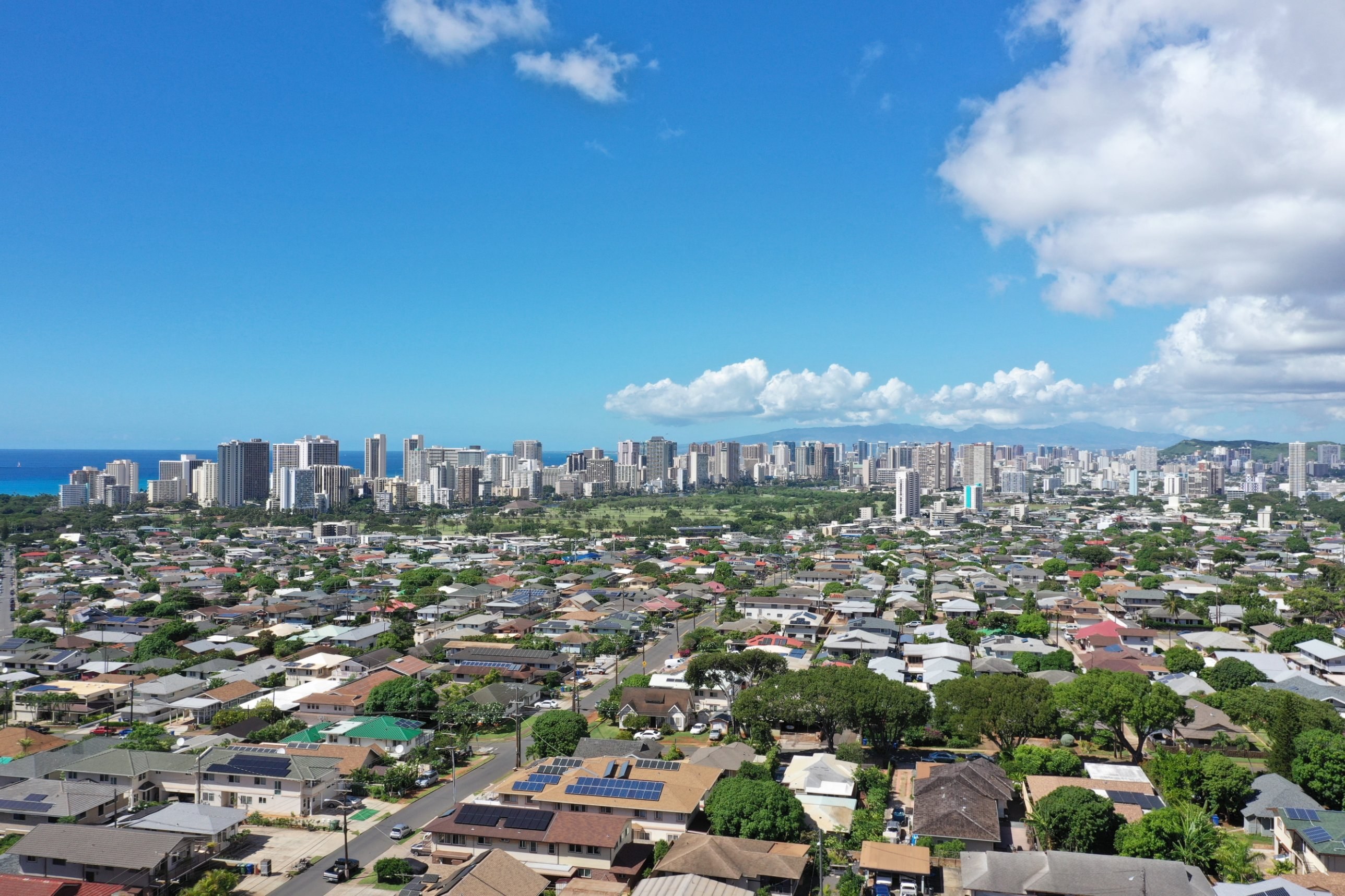 Aerial view over Kaimuki toward the Waikiki skyline and the ocean