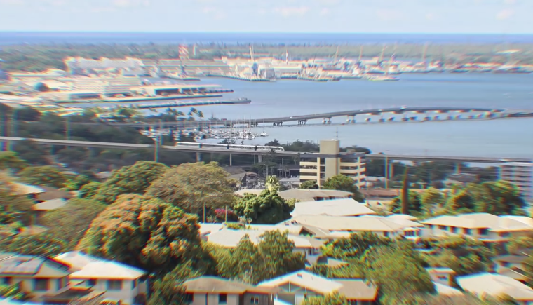 Skyline's elevated guideway running along the Pearl Harbor shoreline
