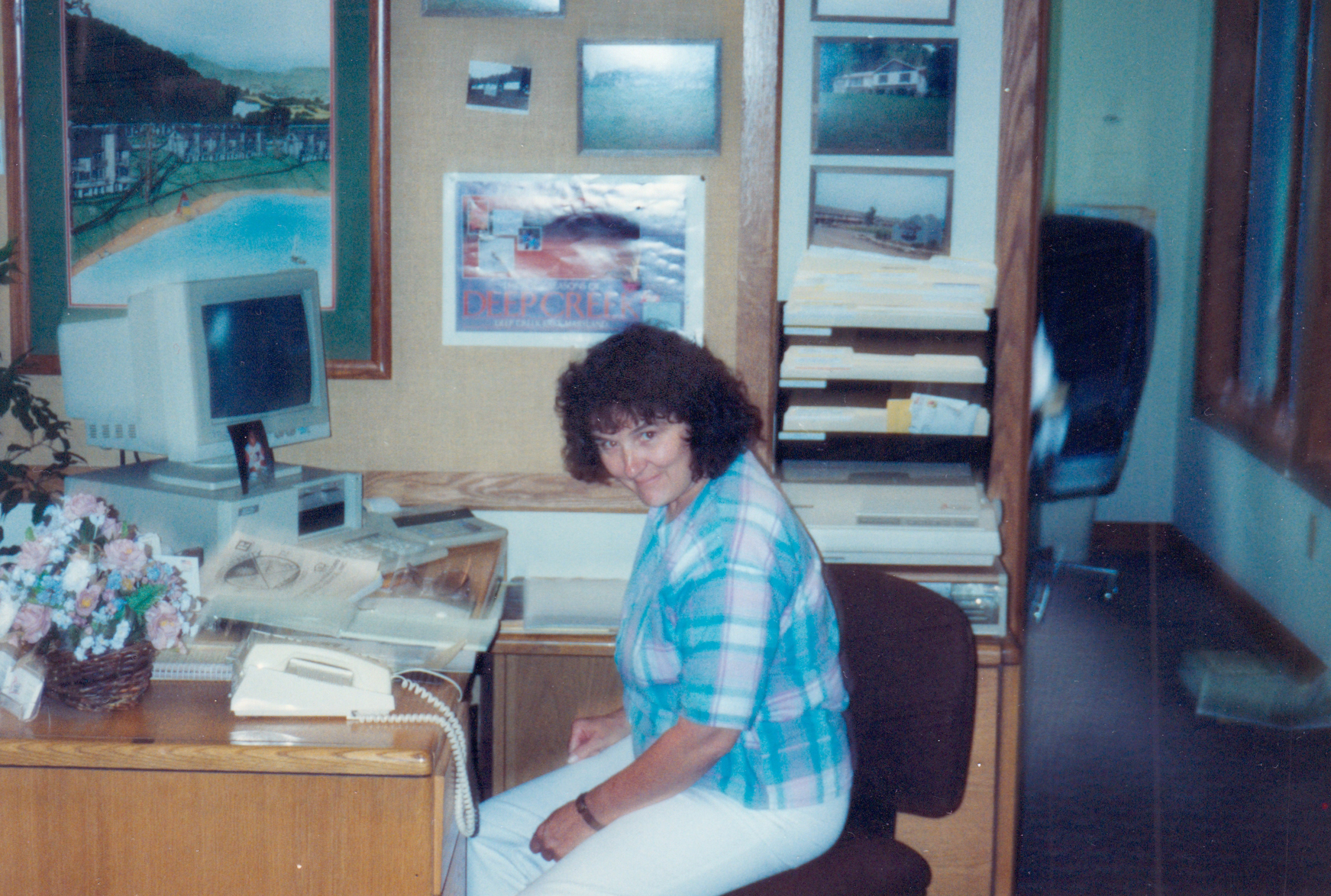 Sis Railey working at her desk